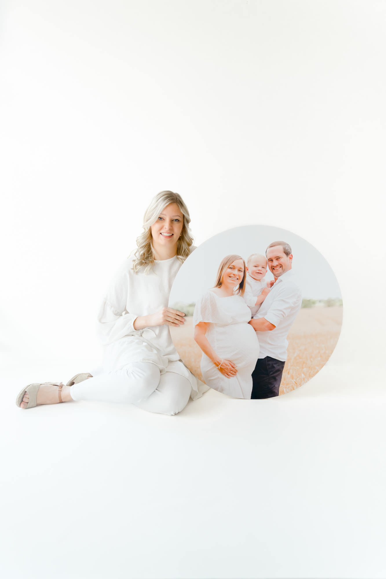 Colchester photographer holding maternity photography wall art