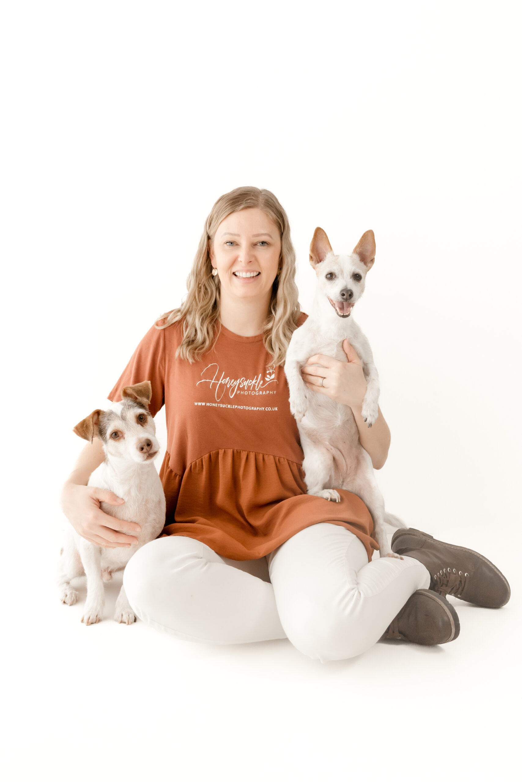 2 jack russell dogs with owner at dog photoshoot in colchester